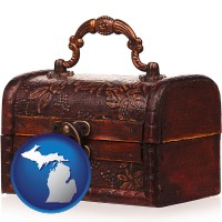 michigan map icon and an antique wooden chest