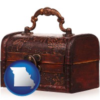 missouri map icon and an antique wooden chest