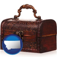 montana map icon and an antique wooden chest