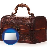 north-dakota map icon and an antique wooden chest