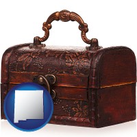 new-mexico map icon and an antique wooden chest