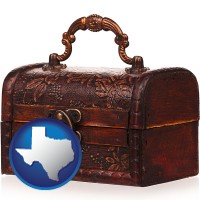 texas map icon and an antique wooden chest