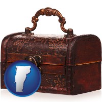vermont map icon and an antique wooden chest