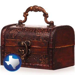 an antique wooden chest - with Texas icon